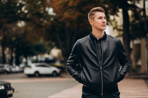 young-handsome-man-walking-down-street_1303-24594