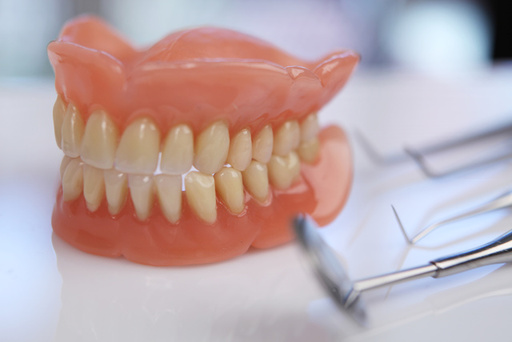 The Importance of Regular Checkups for Denture Wea