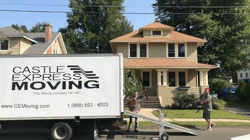 Castle-Express-professional-movers-are-carefully-l